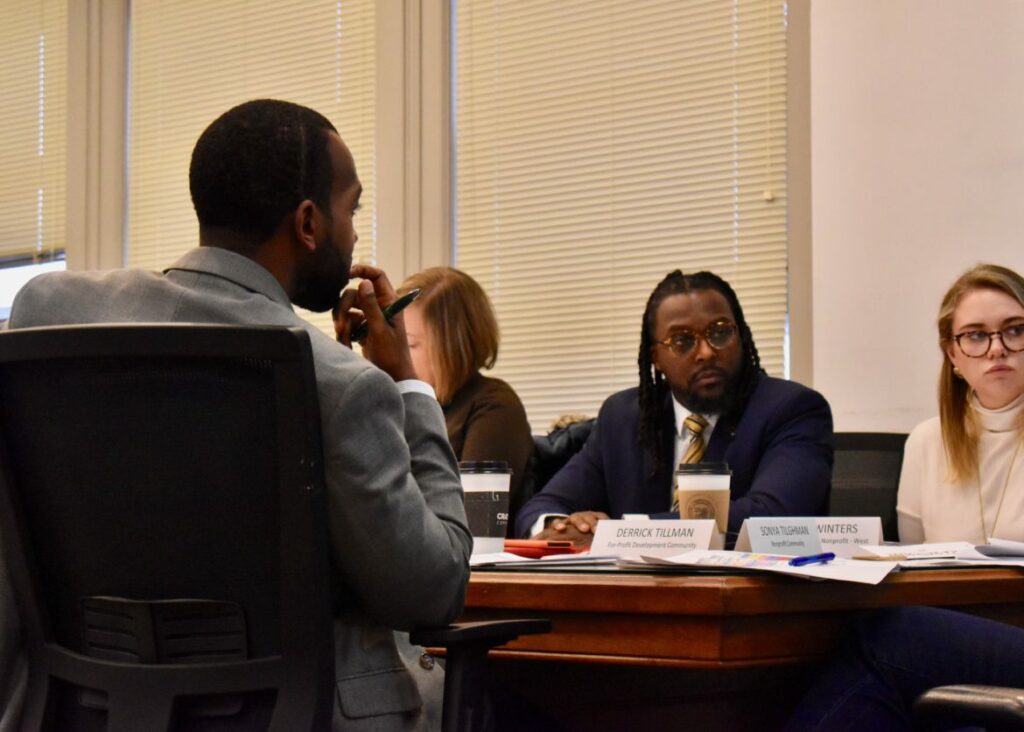 Housing Opportunity Fund advisory board members Derrick Tillman (left), Joanna Deming, Knowledge Build Hudson and Megan Winters at a Dec. 10, 2019 meeting on the fund's 2020 draft allocations budget.